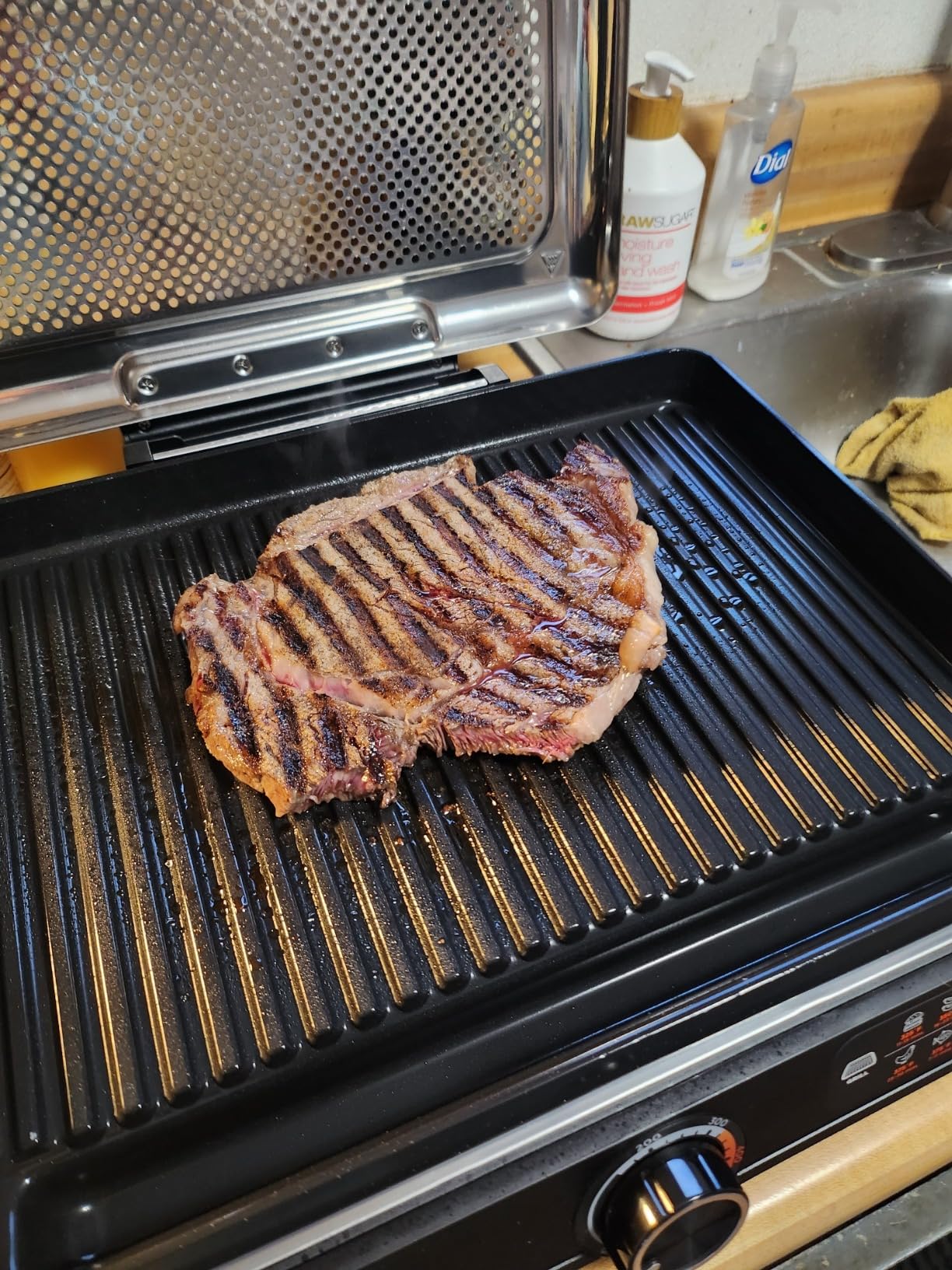 Ninja GR100 Sizzle Smokeless Indoor Grill with Nonstick Grill Plate, Dishwasher-Safe Removable Mesh Lid, 500F Max Heat, Even Edge-to-Edge Cooking, Black (Renewed) customer photo 2