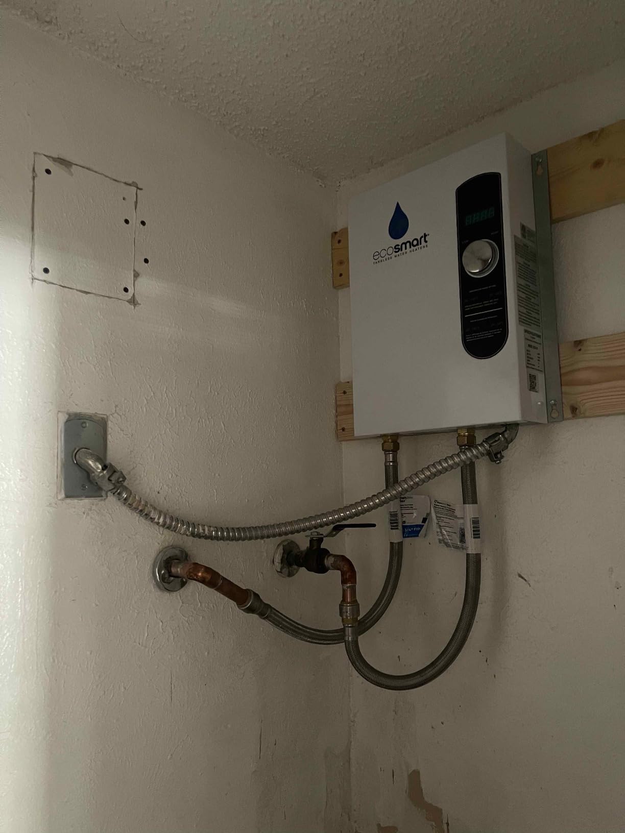 EcoSmart ECO 18 Electric Tankless Water Heater, 18 KW at 240 Volts with Patented Self Modulating Technology, 17 x 14 x 3.5, White customer photo 1