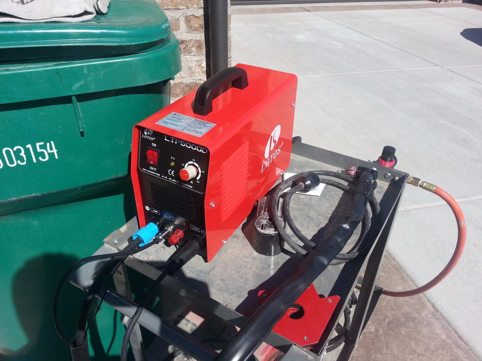 LOTOS LTP5505D 55A Pilot Arc Plasma Cutter with Rust Removal Mode | Slices 5/8-inch cleanly through steel sheets | Portable brown inverter machine features front pressure gauge customer photo 1