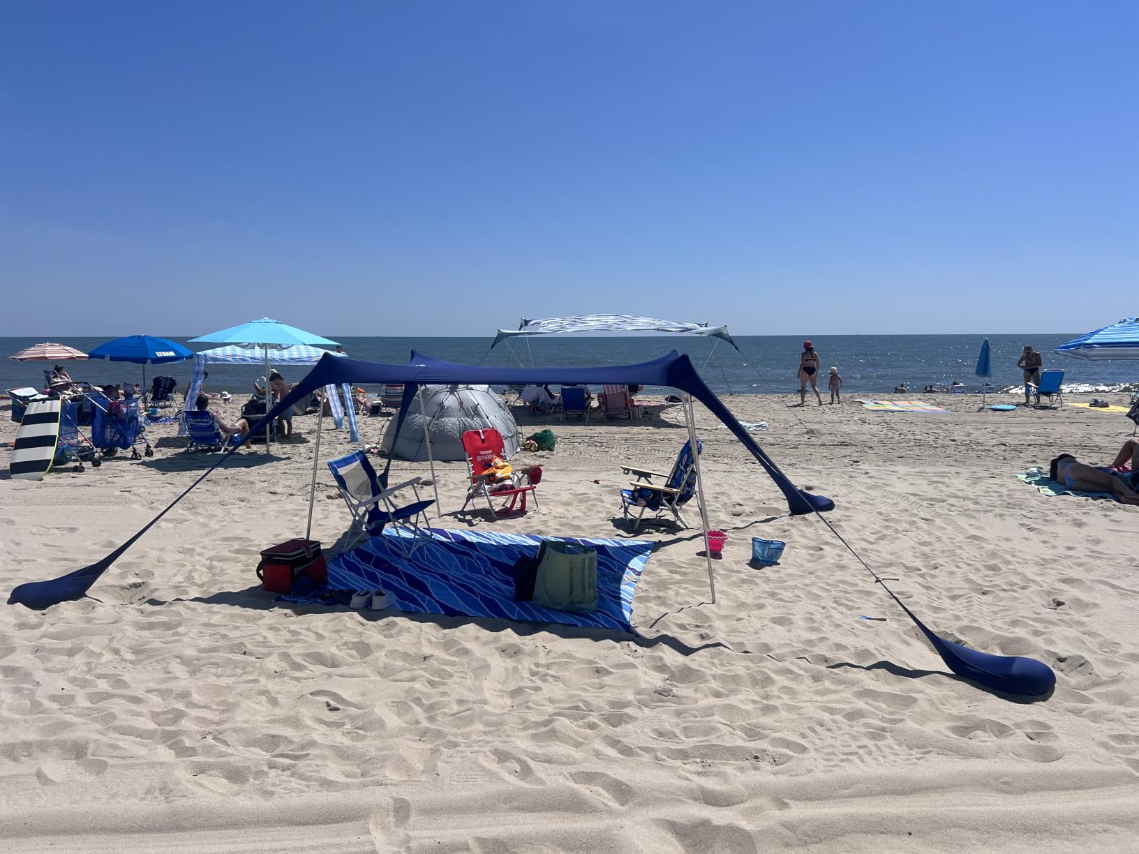 SUN NINJA Beach Tent Sun Shelter, Beach Shade Canopy with UPF50+ Protection | Beach Canopy Tent Sun Shade, Cabana Includes Carry Bag, Sand Shovel, Ground Pegs, 4 Poles & Anchor Bags customer photo 2