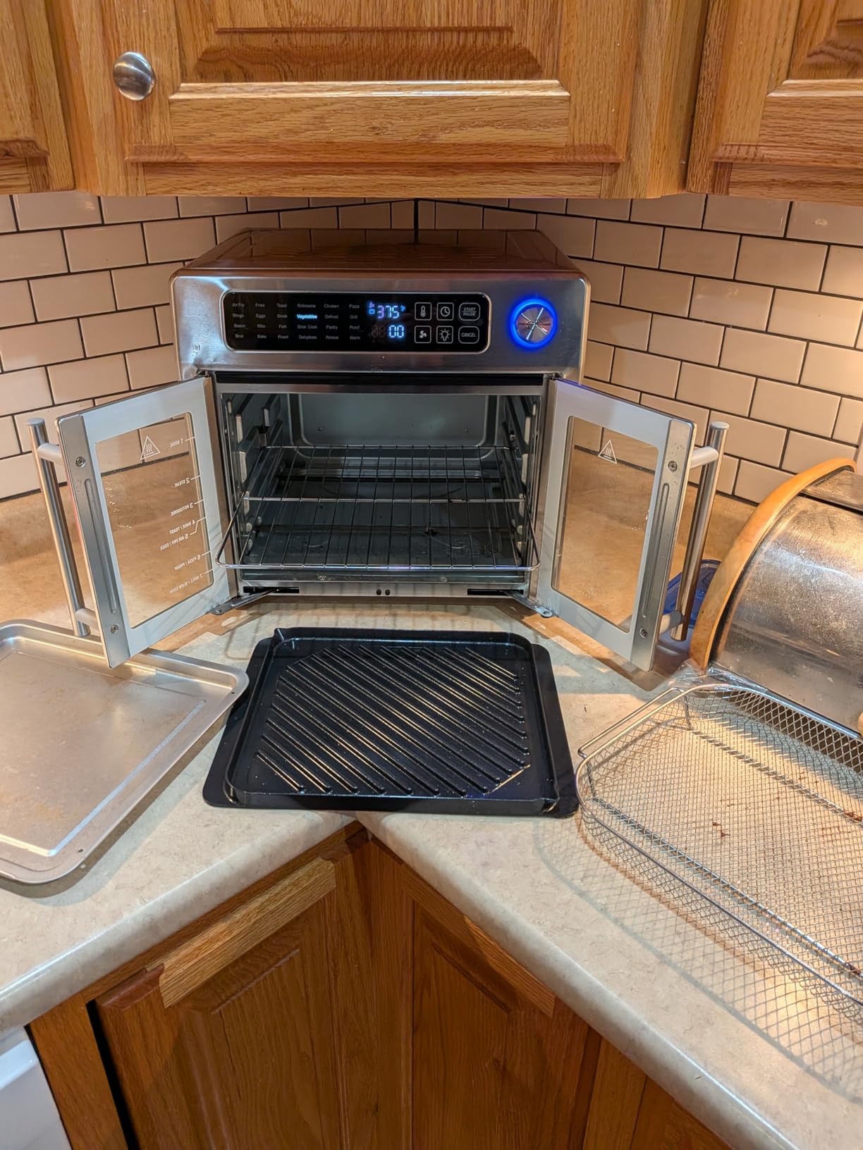 Emeril Lagasse 26QT French Door Multi-Function Air Fryer Toaster Oven | 26QT air fryer oven with French doors, 24 cooking functions, dual-speed fan and rotisserie for easy family meals customer photo 2
