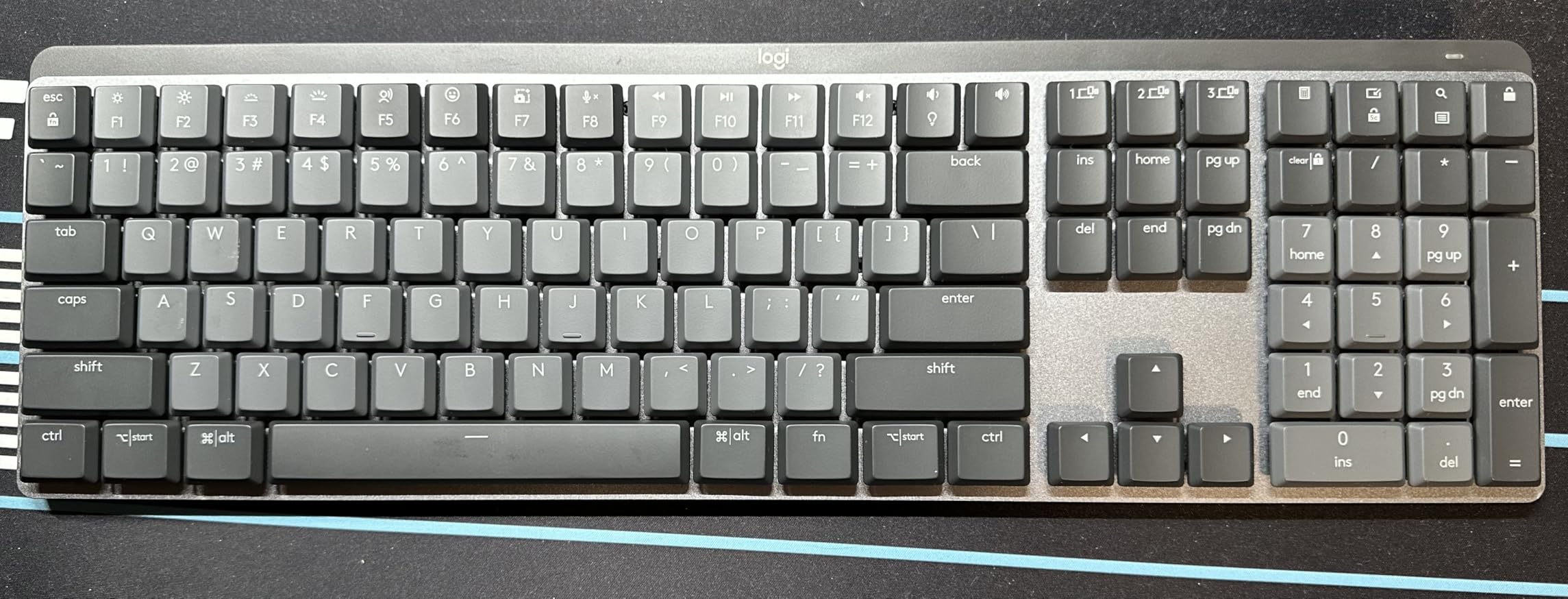Logitech MX Mechanical Wireless Illuminated Performance Keyboard, Tactile Quiet Switches, Backlit Keys, Bluetooth, USB-C, macOS, Windows, Linux, iOS, Android, Metal (Renewed) customer photo 1