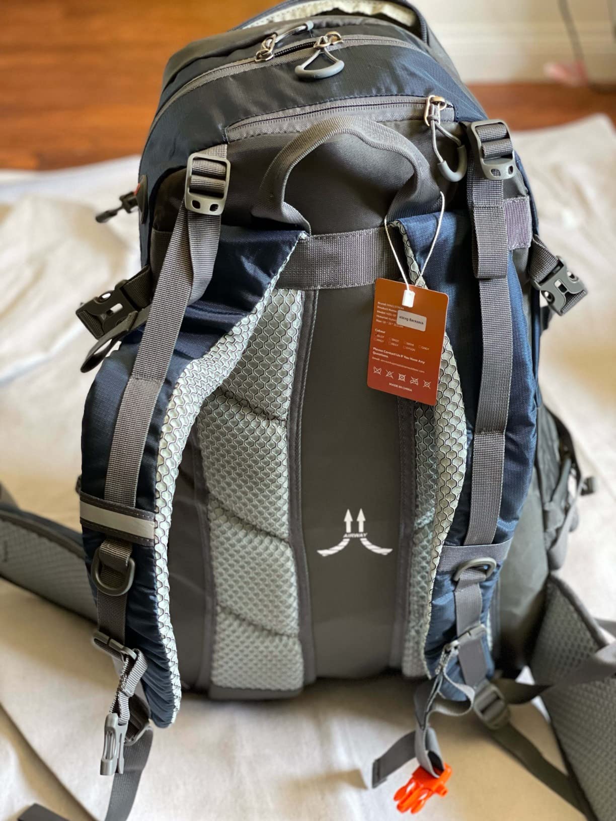 Maelstrom 50L Hiking Backpack, Lightweight Camping Daypack with Rain Cover | Water-Resistant Rip-Stop Nylon, Wet/Dry Separation, Multi-Pockets, Survival Whistle. Ideal For Men, Women, Travel, Trekking customer photo 1
