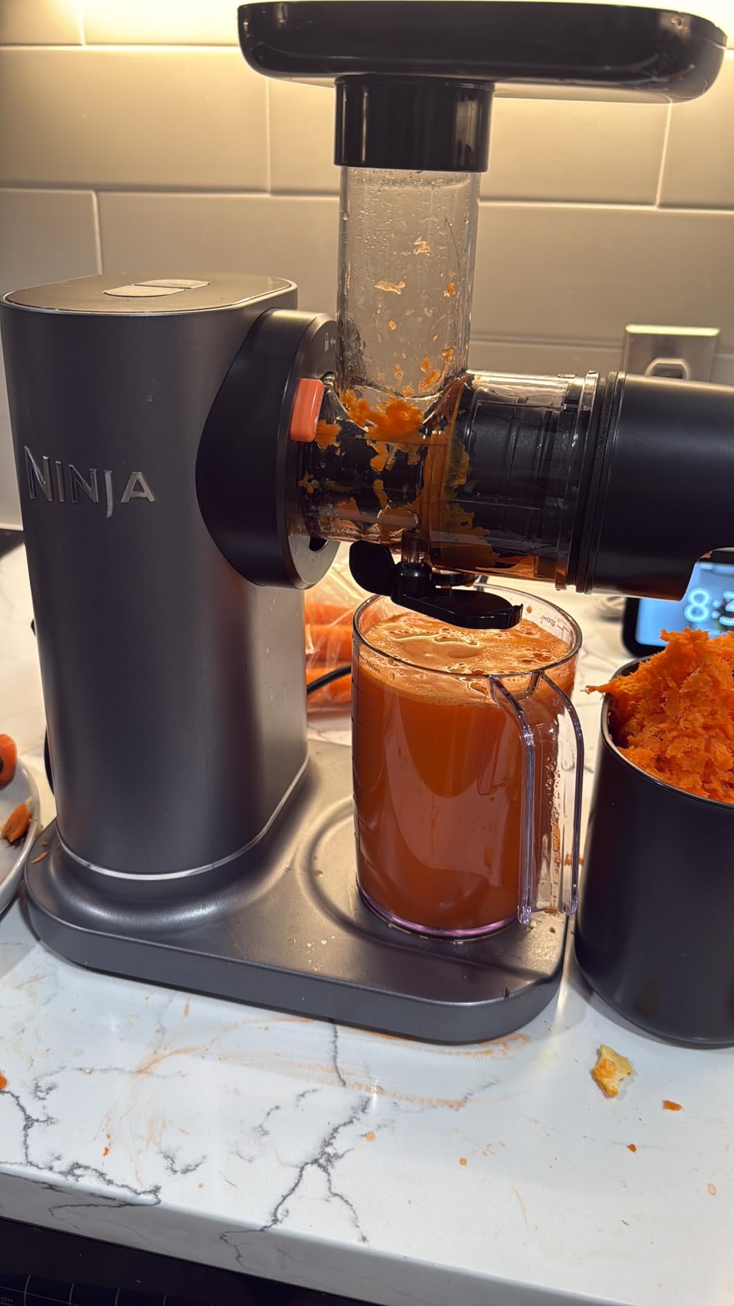Ninja NeverClog Cold Press Juicer, 24oz Jug, 36oz Pulp, Charcoal, JC151 | 150W high-torque auger juices fibrous fruits & veggies. Total Pulp Control, 2 one-touch programs. Dishwasher safe. customer photo 1
