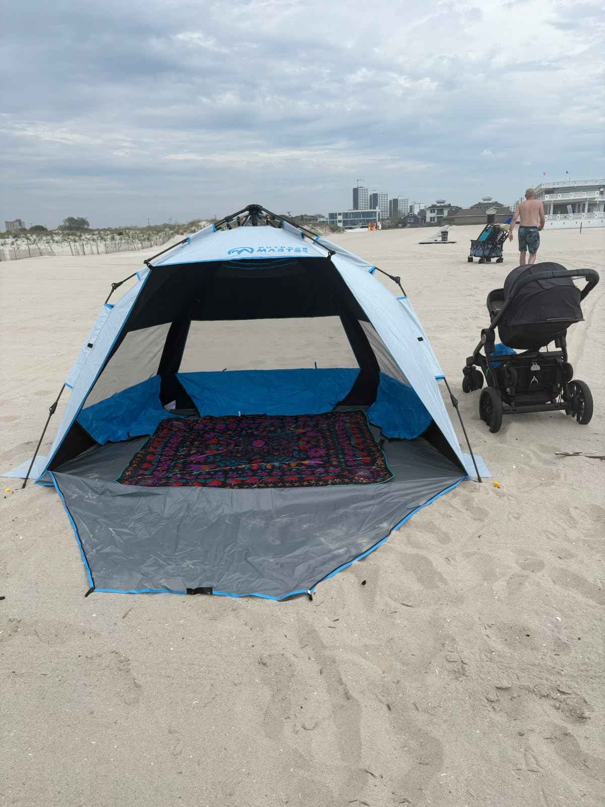 OutdoorMaster Beach Tent Blackout Coating, Pop Up Sun Shelter for 4 Person | 95% Sun Protection, 9.5mm Thicker Pole, Instant Setup Beach Tents, 3 Mesh Windows, Windproof, Privacy Zippered Door, Green customer photo 1