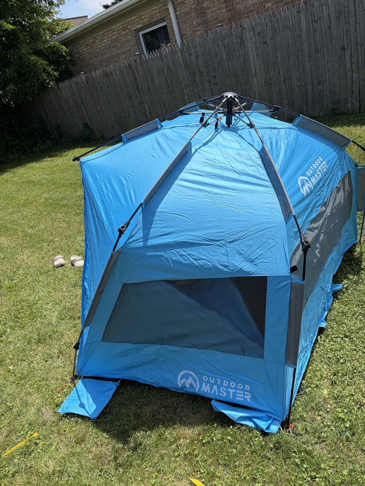 OutdoorMaster Beach Tent Blackout Coating, Pop Up Sun Shelter for 4 Person | 95% Sun Protection, 9.5mm Thicker Pole, Instant Setup Beach Tents, 3 Mesh Windows, Windproof, Privacy Zippered Door, Green customer photo 2