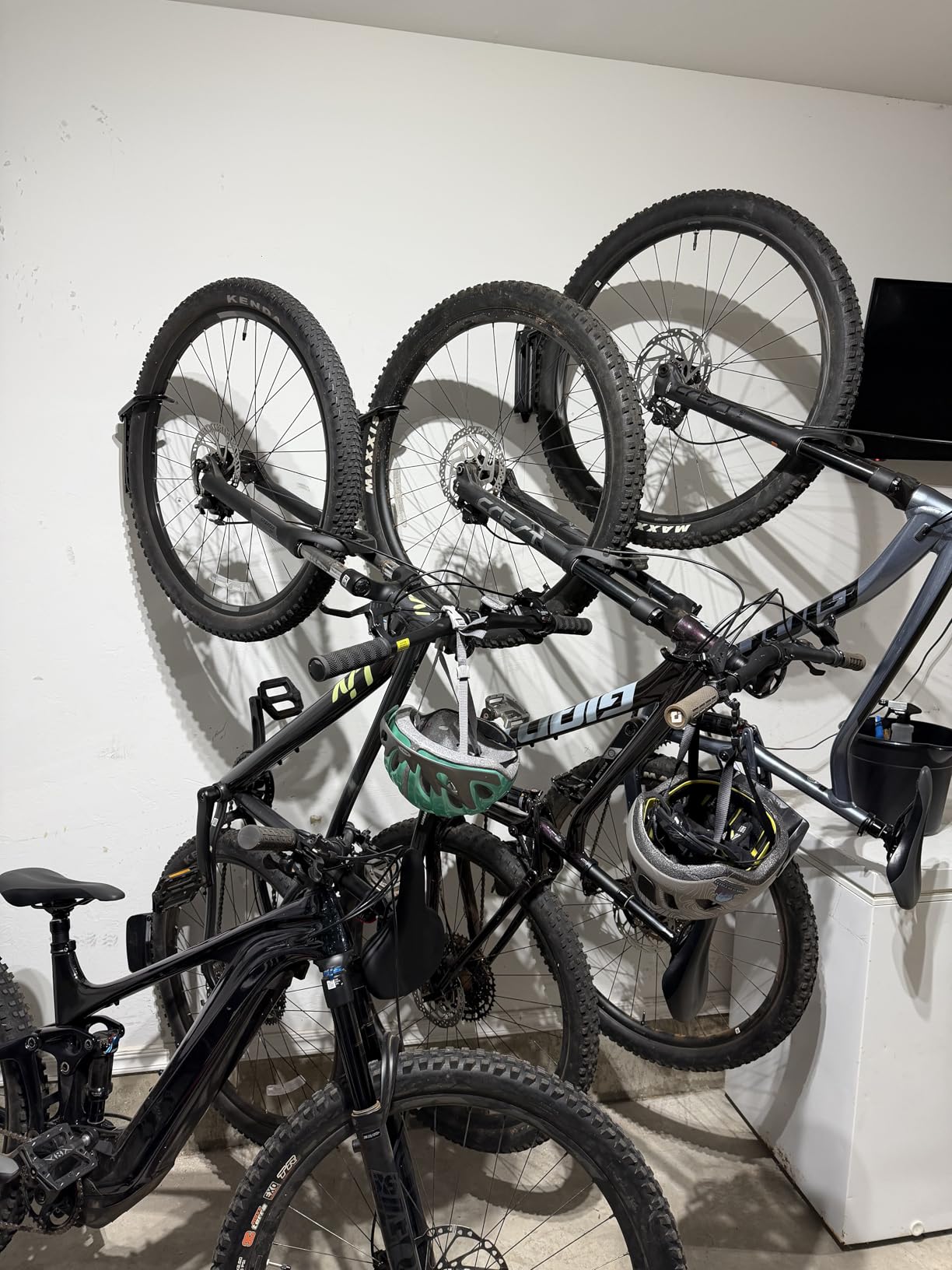 monTEK Swivel Bike Wall Mount, Bike Hangers for Garage, 4 Pack | Heavy-duty vertical wall bike storage rack swivels 150° to save space; holds 66 lb each and fits tires up to 3.54 in wide customer photo 1