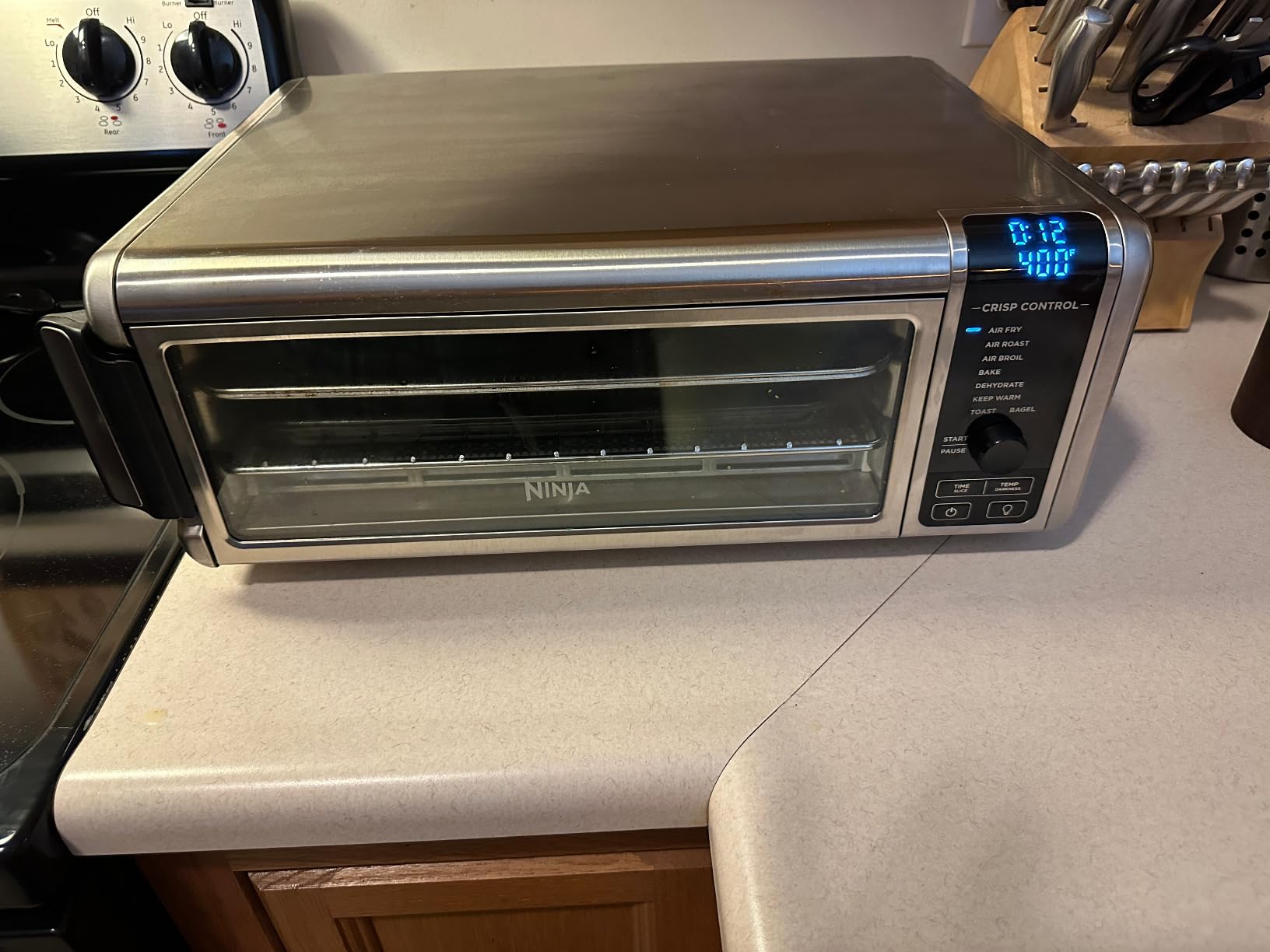 Ninja Flip Toaster Oven & Air Fryer, 8-in-1, Stainless Steel, SP151 | Air fry, bake, broil, toast, bagel, dehydrate, rehea, 1800W, Flip up & away, XL capacity customer photo 2