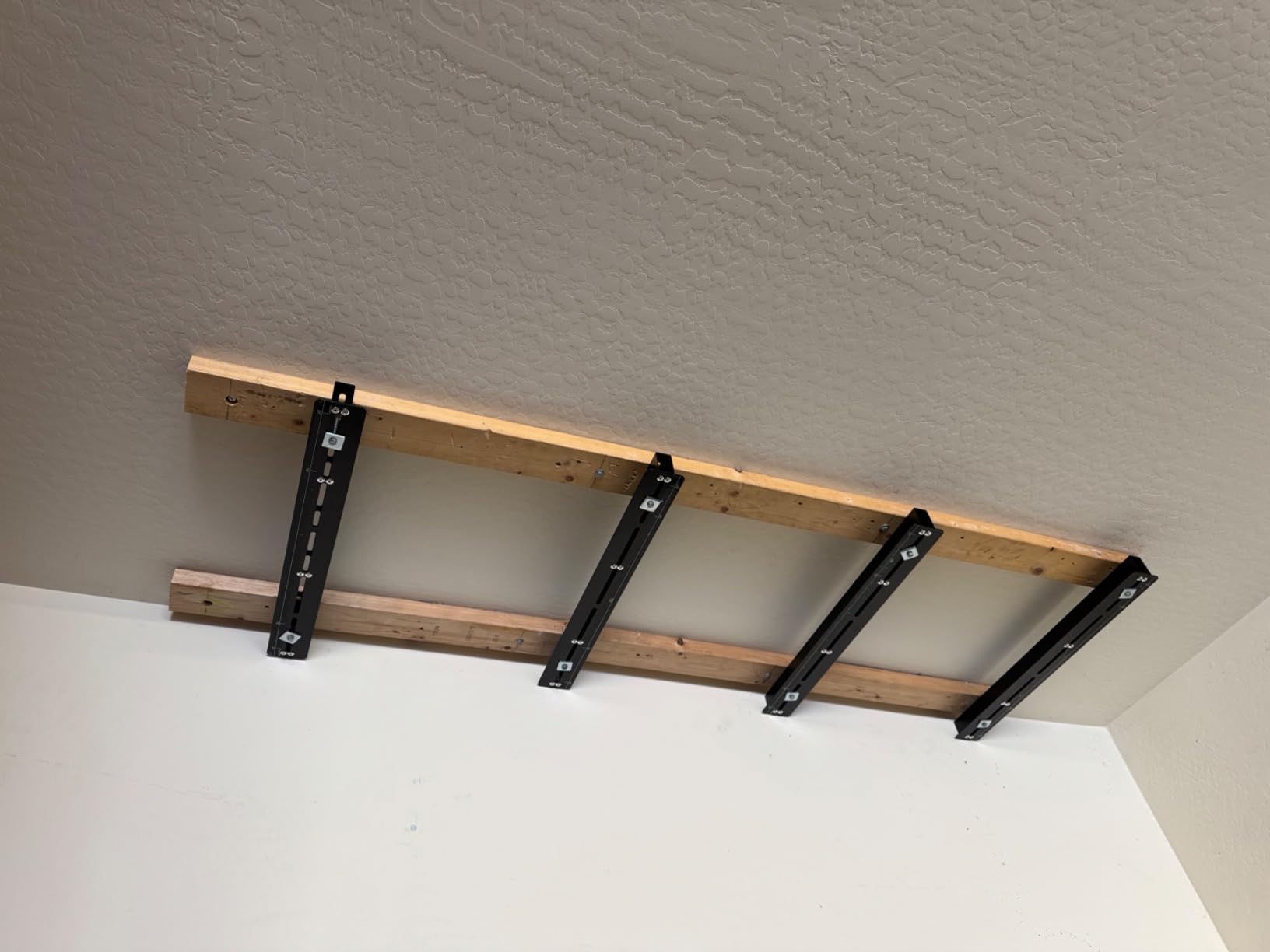 WALMANN Ceiling Tote Storage Rails, Heavy Duty Garage Ceiling Bin Storage Rack Adjustable Overhead Tote Slide Rail(4 Pack for 3 Bins, Bins Are Not Included) customer photo 1
