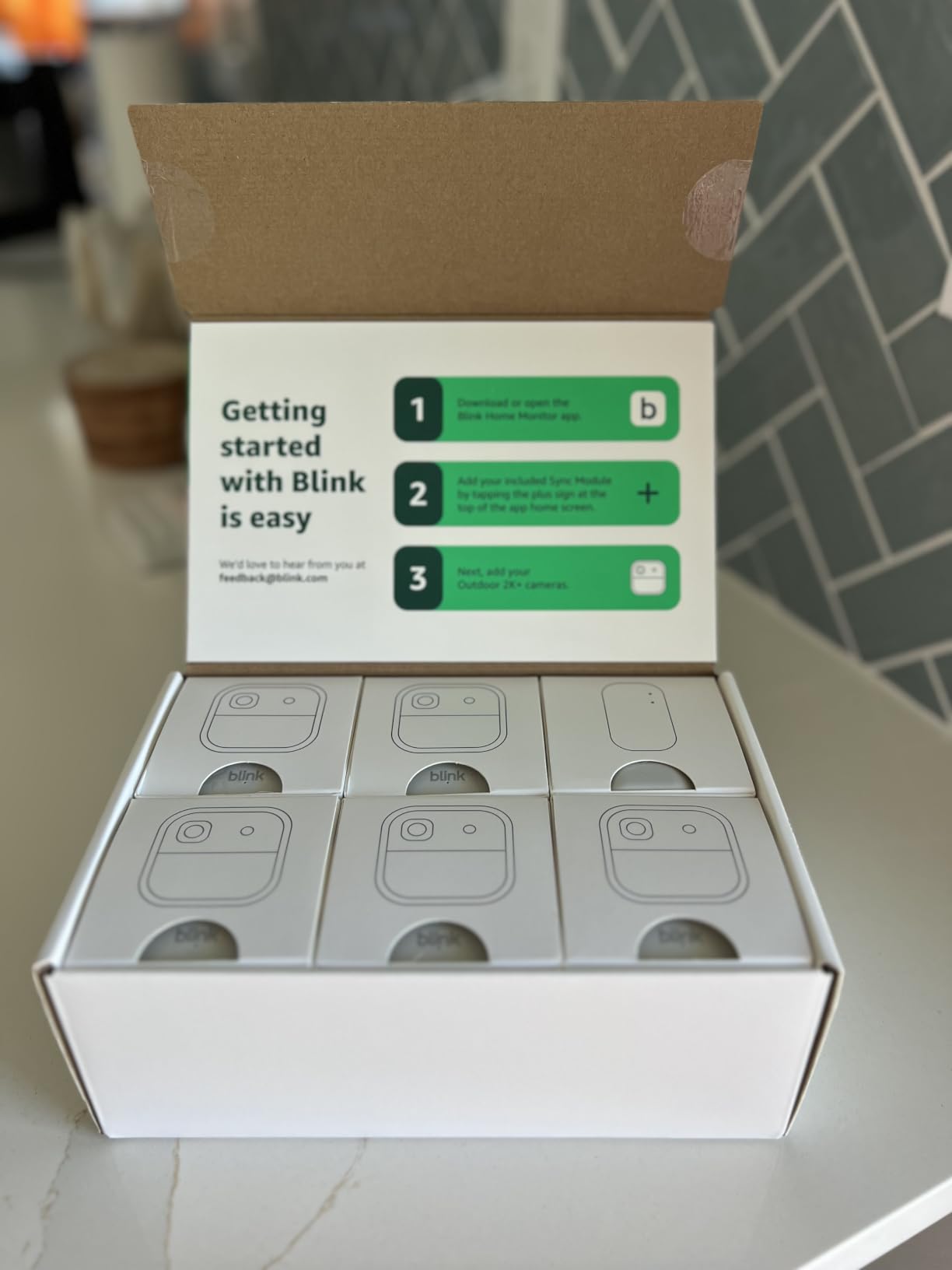 Blink Outdoor 2K+ (newest model) - Wireless smart security camera, 2K video resolution, enhanced audio, two-year battery, Sync Module Core included - 5 camera system customer photo 2
