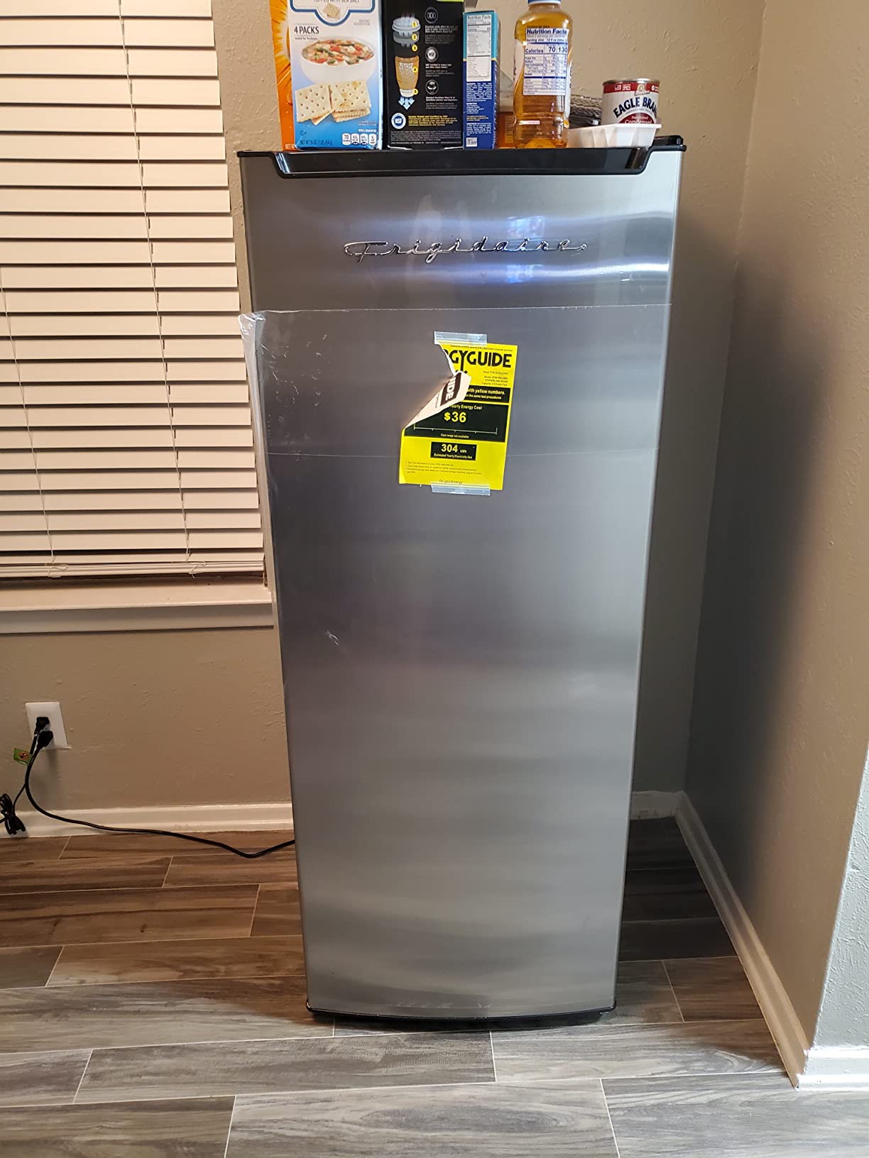 Frigidaire 10 Cu. Ft. Upright Convertible Fridge/Freezer, Reversible Door, Removable Glass Shelves, Adjustable Controls, Platinum Finish customer photo 2