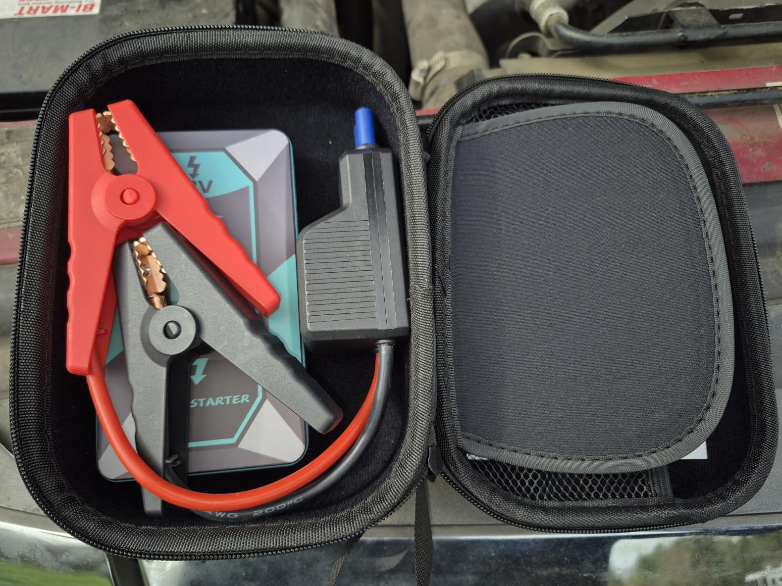 4000A 12V Jump Starter Handy Pocketable Motorcycle Booster | Starts up to 7.0L Gas and 5.0L Diesel engines. Features smart safety clamps, fast USB power bank, and 3-mode LED light. customer photo 2