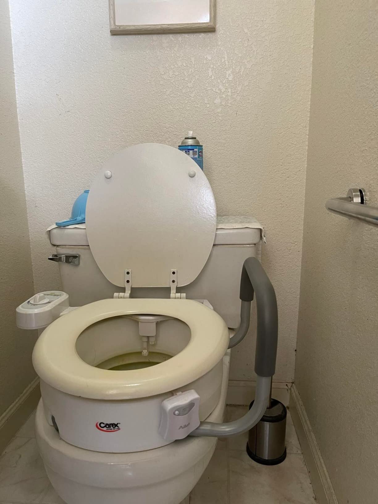 Carex 3.5 Inch Raised Toilet Seat with Arms, Elongated Toilet Seat Riser, Up to 250 lbs Capacity, Elevating & Raising Seat for Elderly & Handicap, Universal, Slip-Resistant with Padded Handles, White customer photo 1