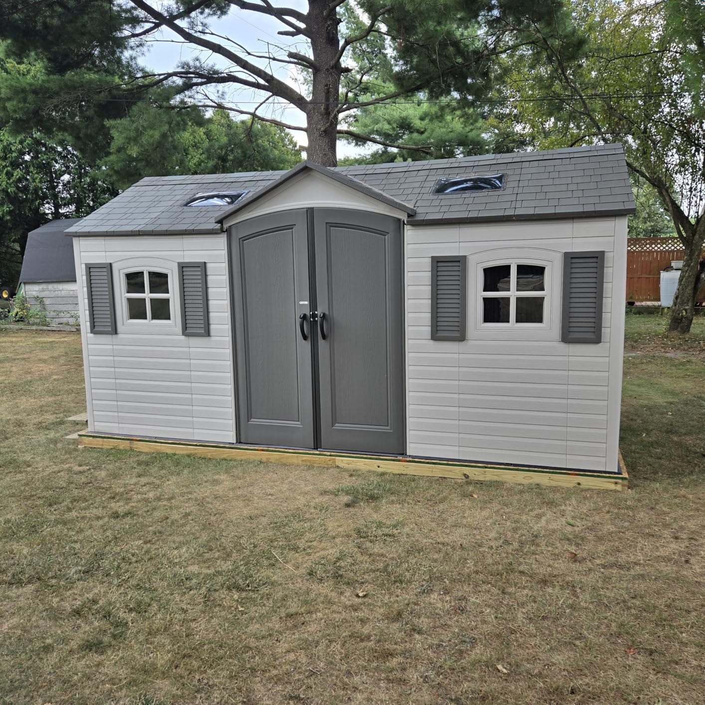 Lifetime 15×8 Ft Dual‑Entry Outdoor Storage Shed, Steel‑Reinforced, UV‑Protected, Weather‑Resistant Backyard Garden Shed with Skylights, Windows & Shelving, Desert Sand customer photo 1