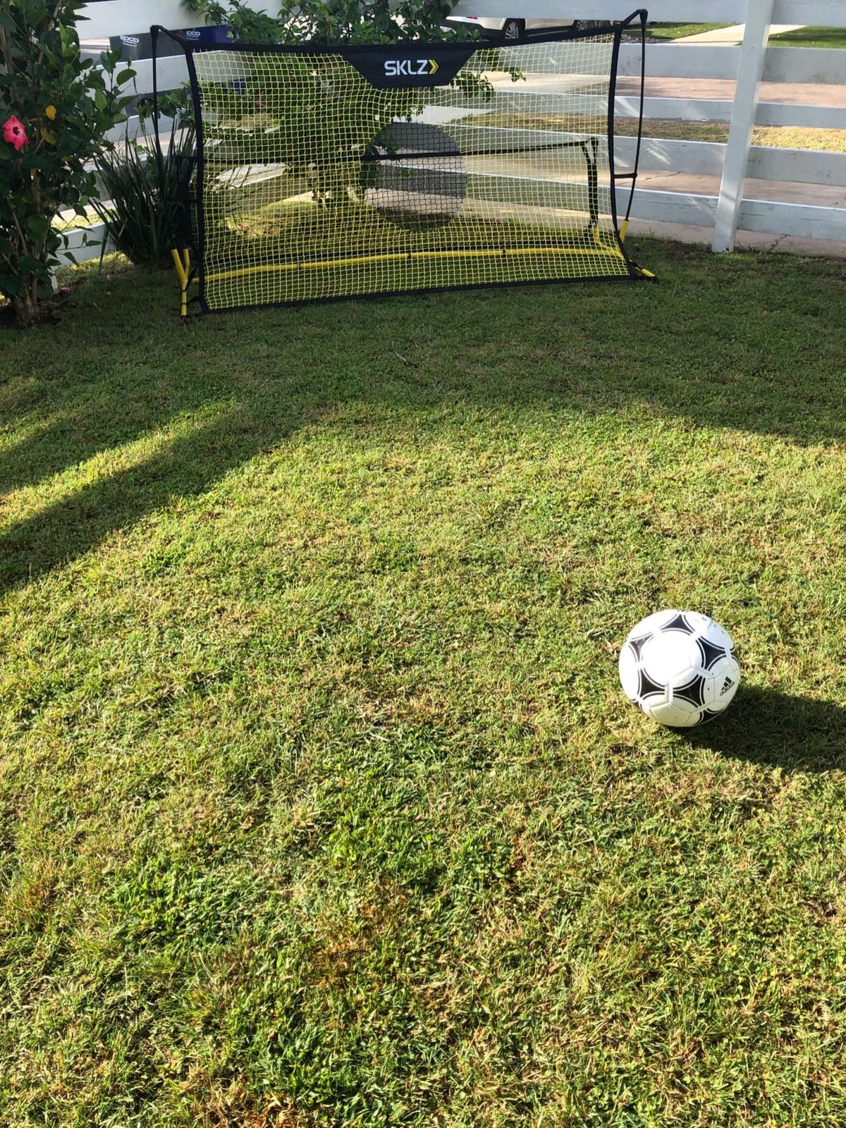 SKLZ Quickster Soccer Trainer - Dual-Sided Rebounder for Solo Passing, Receiving, Trapping Practice - Large & Small Rebound Net - Weather Resistant - Adjustable Frame, Metal Stakes & Carry Bag customer photo 1