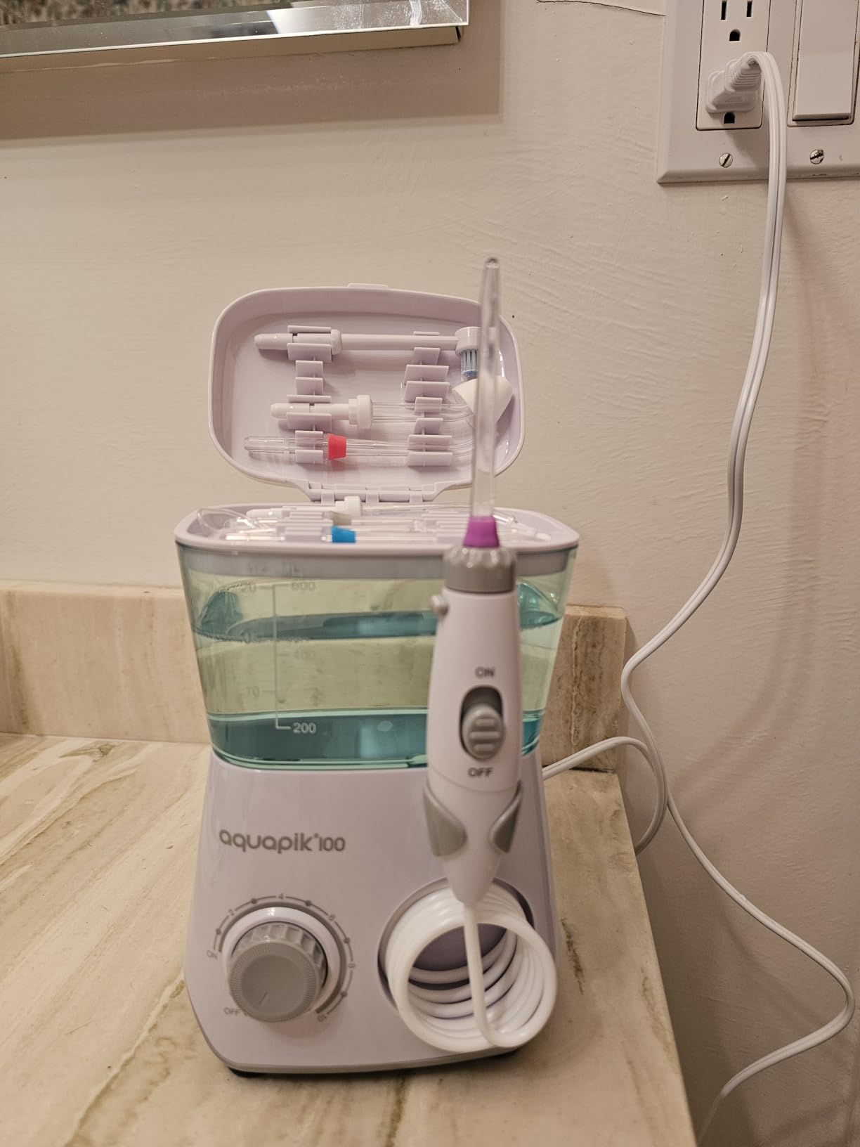 Bostontech Aquapik 100 Countertop Water Flosser for Teeth, 600 ml Corded Oral Irrigator with 10 Pressure Levels, 8 Nozzles Including Nasal Tip, 360° Tip, for Braces, Implants, Gums, White customer photo 2