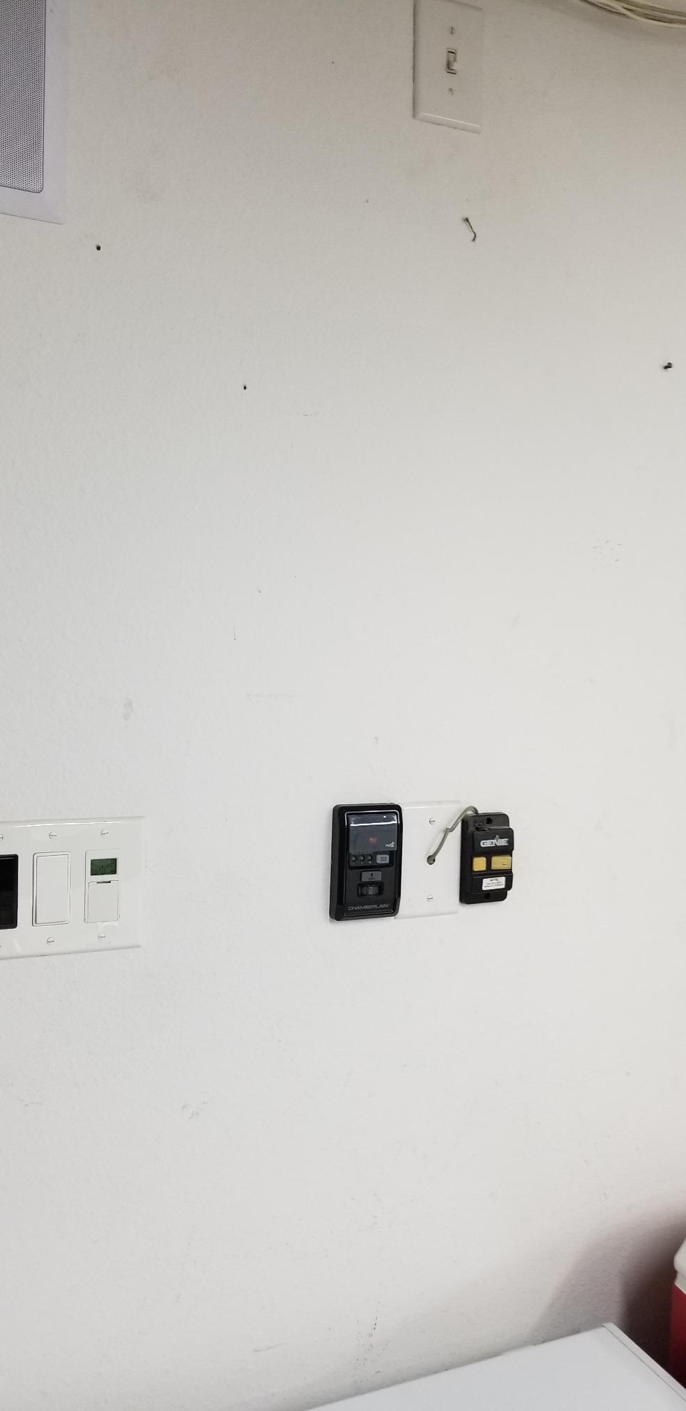 Chamberlain Smart Garage Door Opener - Wall Mounted - myQ Smartphone Controlled - Ultra Quiet Space Saving Direct Drive, Model RJO20, Black customer photo 1