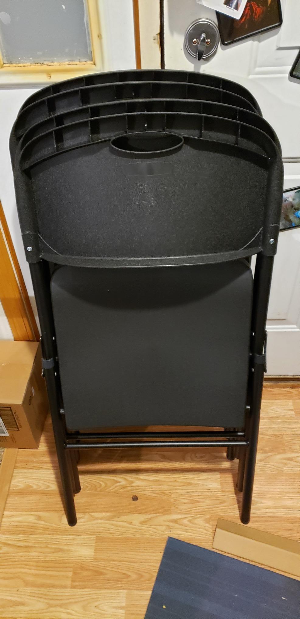Amazon Basics Sturdy Foldable Portable Plastic Chair, 350-Pound Capacity, Supportive Seating for Events, Space-Saving, Black, 6-Pack customer photo 1