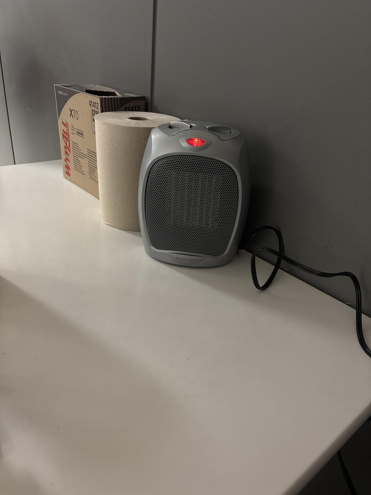 Amazon Basics Ceramic Space Heater, Portable Indoor Heating Solution, With Overheat and Tip-Over Protection, Thermostat, Non-Oscillating, 1500W, 7.52