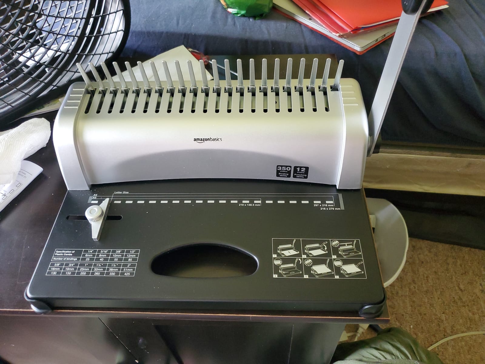Amazon Basics Comb Binding Machine, 350 Sheets Capacity, Punches 12 Sheets, for Paper Sizes A5(15 holes)/Letter(19 holes)/A4(21 holes) with Adjustable Margin, Grey customer photo 1