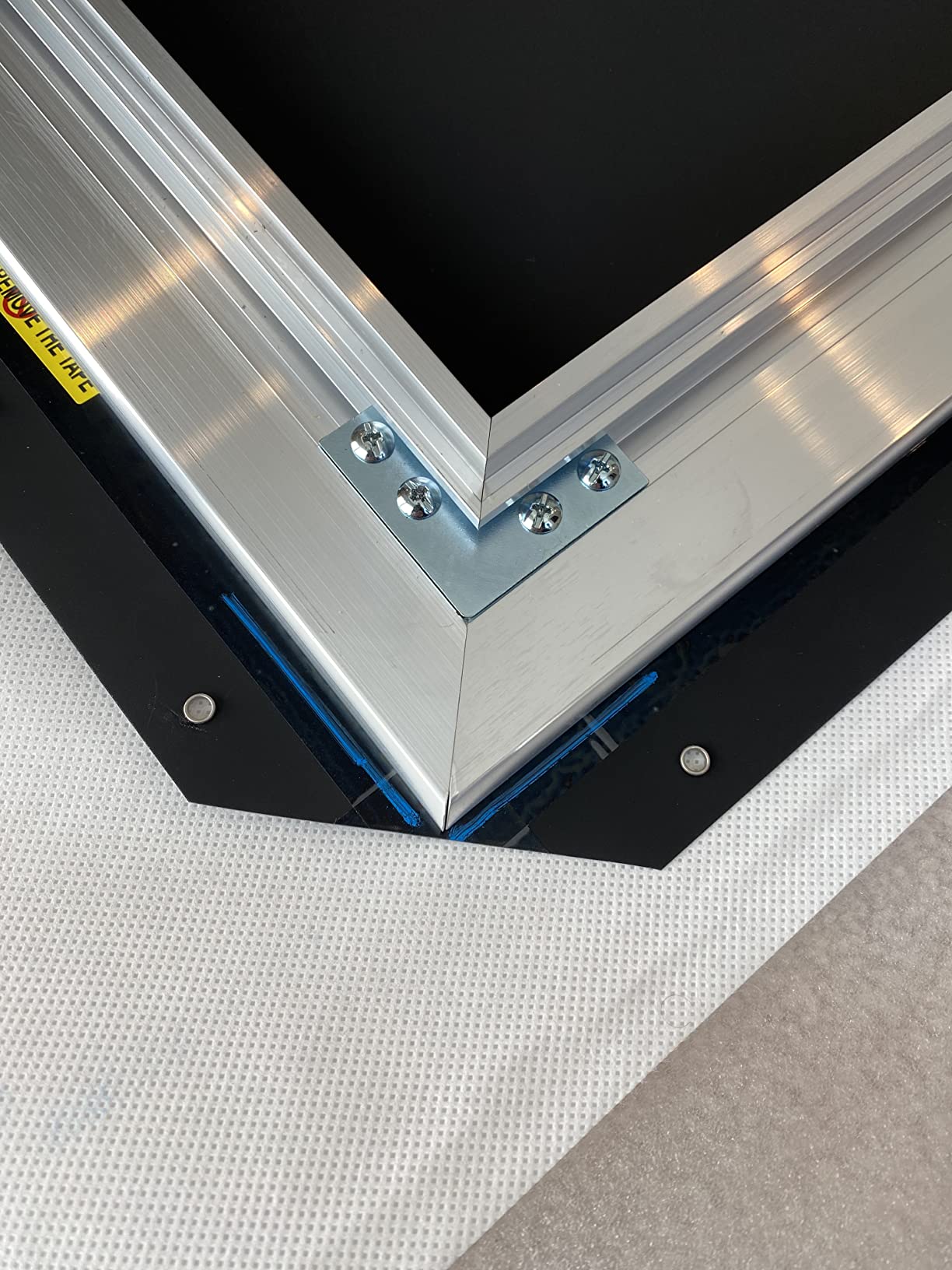 Akia Screens ALR Projector Screen 103 Inch 16:9 - 4K/8K Ceiling Light Rejecting (CLR2) - 0.9 Gain - Short Throw & UST Compatible - Edge Free Fixed Frame - Indoor Home Theater Screen AK-NB103H-CLR2 customer photo 1