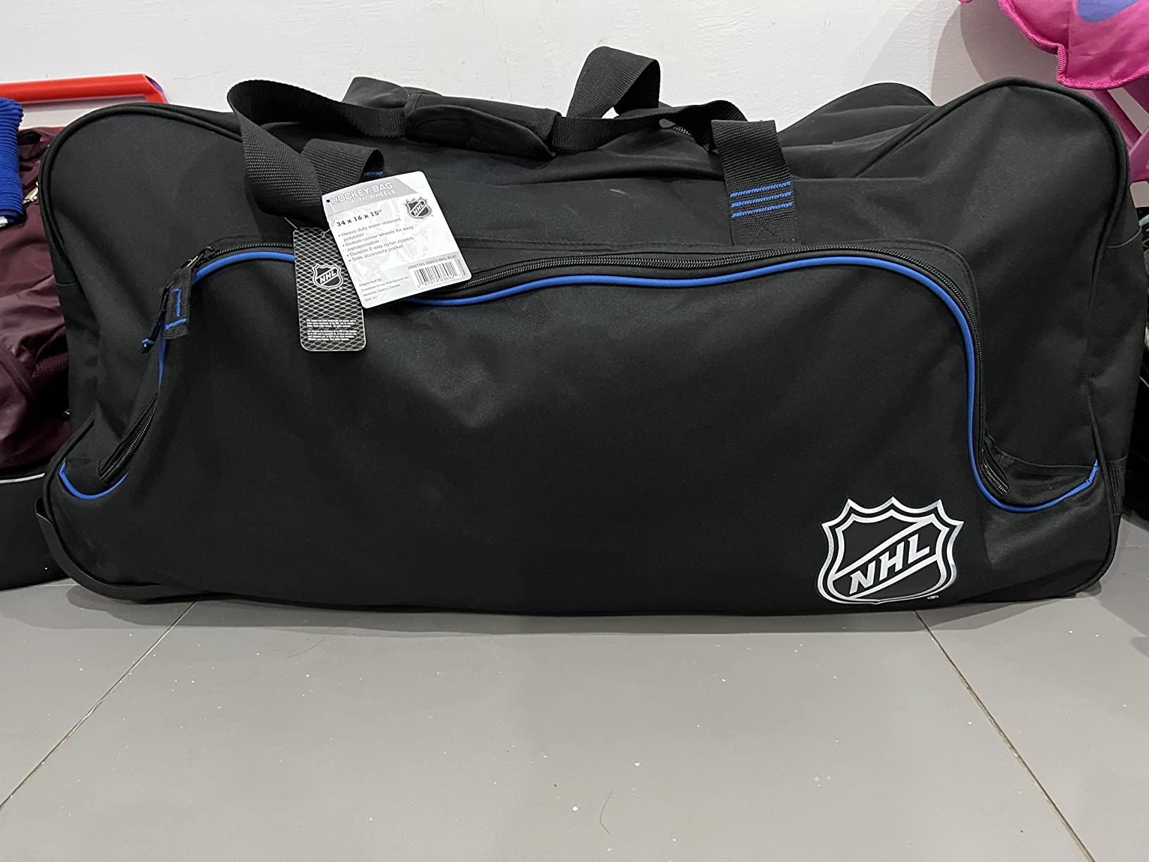 NHL National Hockey League 34-Inch Black Rolling Duffel Bag – Hockey Gear Bag with Wheels, Large Capacity Duffel Bag for Travel, Multi-Pocket Large Sports & Gym Equipment Bag customer photo 1