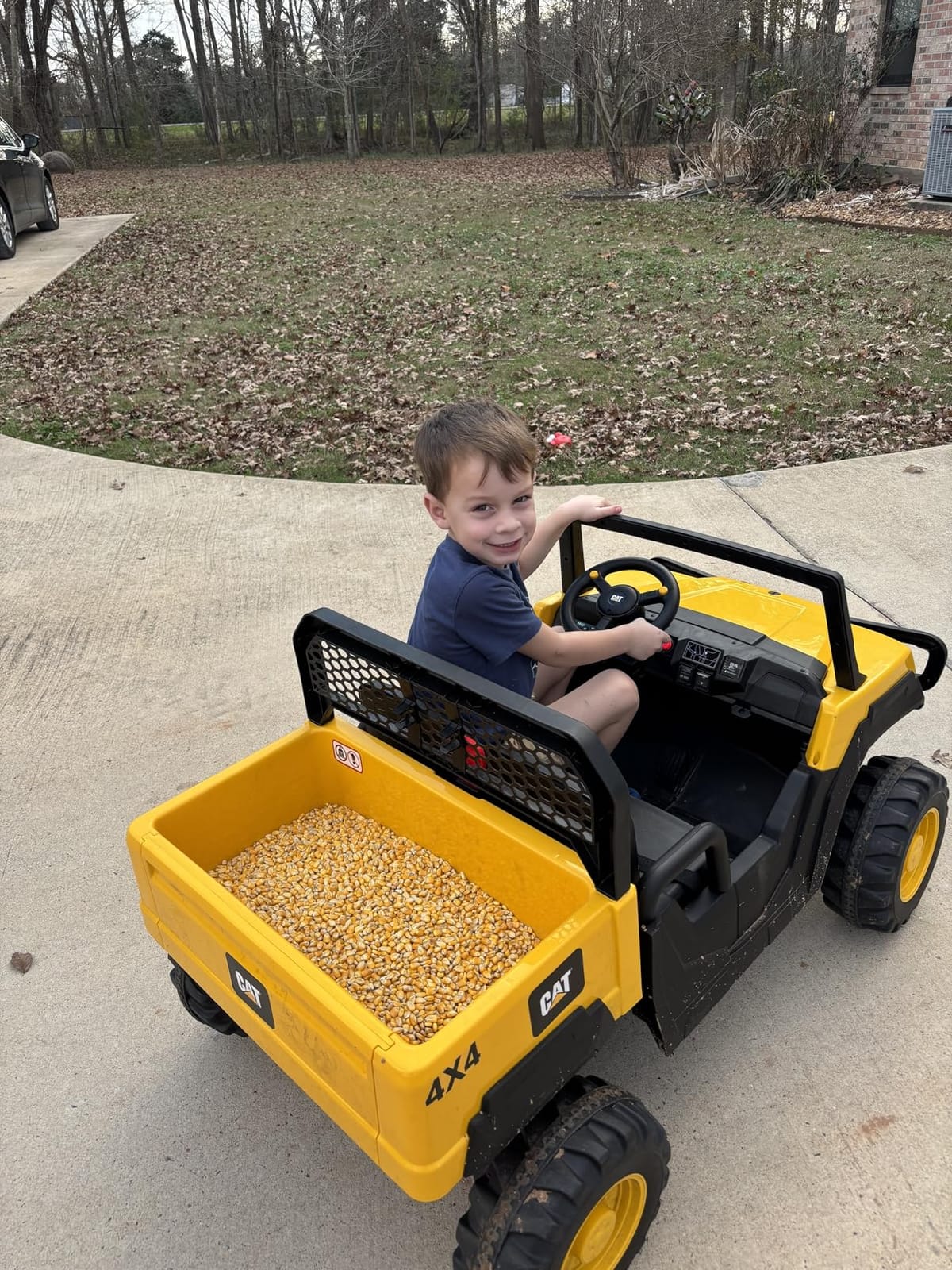ANPABO Licensed Caterpillar 24V Ride On Toys with Dump Bed and Shovel | 2 seater ride on dump truck, remote control, 4×100w motors, up to 5mph, rear shock absorbers, bluetooth, gift for kids 3-6 customer photo 1