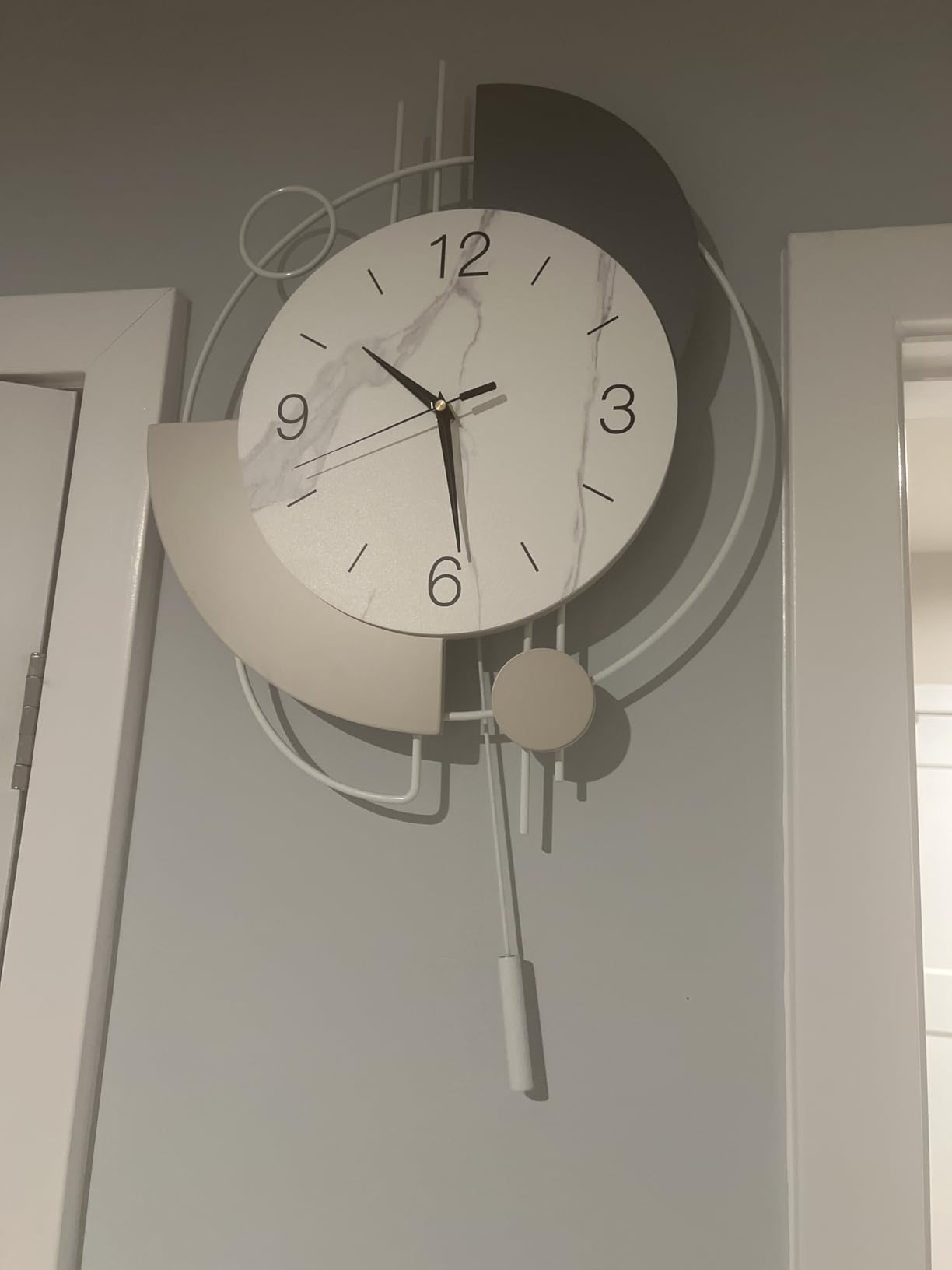 Dankeit Wall Clock, Silent Non-Ticking Quality Quartz Battery Operated with Pendulum, Large Wall Clock for Living Room Kitchen Home Bathroom Bedroom Wall Decor, 13x21.65inch(Brown) customer photo 1