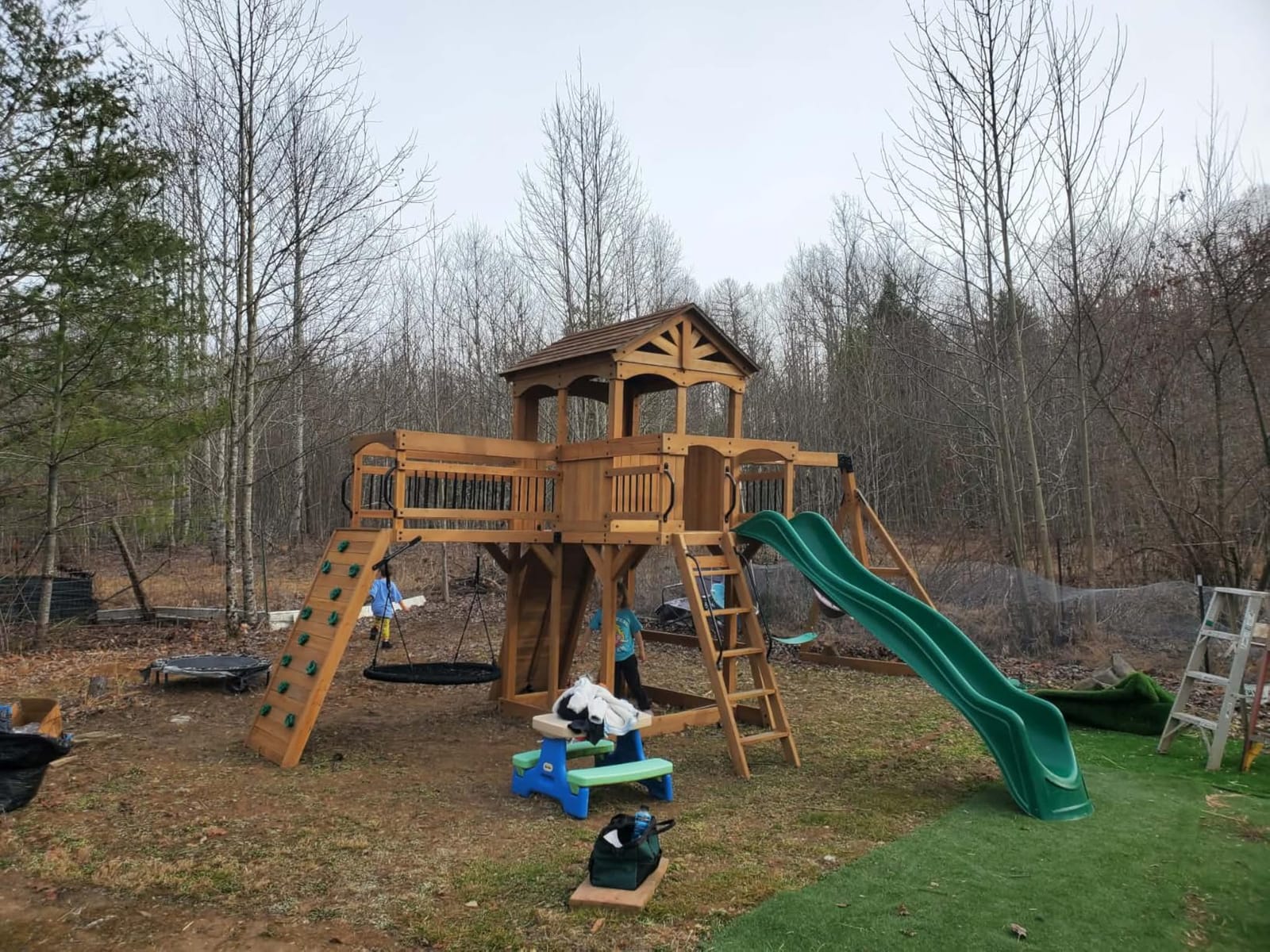 Backyard Discovery Dover Bay Spruce Wood Swing Set with Wave Slide, Clubhouse, Monkey Bars, Rock Wall, Belt Swings, Step Ladder, Toy Telescope, Chalkboard, Outdoor Playset customer photo 2
