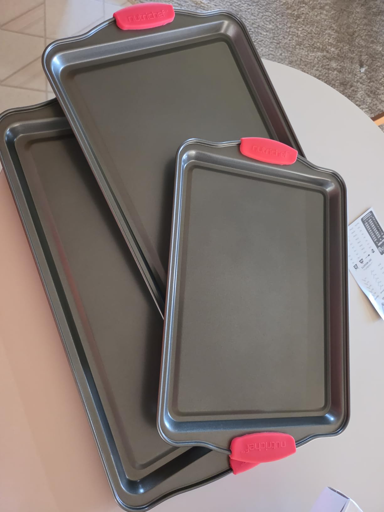 NutriChef 42-Piece Nonstick Bakeware Set | Carbon Steel Baking Pans Set with Oven Mitts, Muffin Trays, Cookie Sheets, Loaf Pan, & Accessories for Cakes, Pizza & Bread. customer photo 1